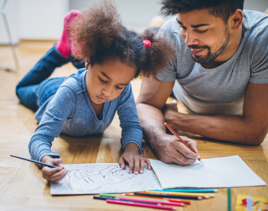 Young black family having fun at home